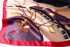Detail shot of purple and pink Calla Lily pattern on smooth satin silk square scarf