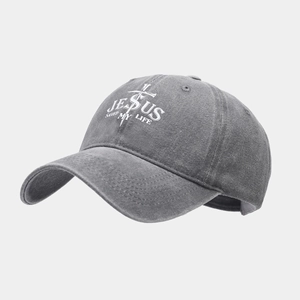 Detail of Jesus Saved My Life embroidery and washed gray cotton on baseball cap