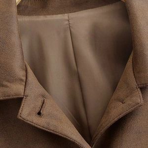Women's vintage brown moto jacket with collar detail and premium fabric texture