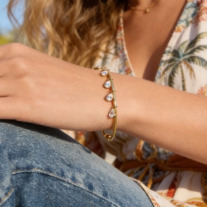 18k gold plated open bangle featuring five sparkling pear-cut zircon drop pendants