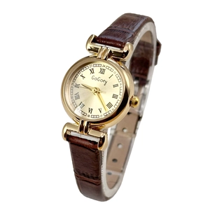 Vintage gold quartz watch for women with brown leather strap and roman numeral dial