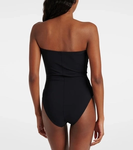 Rear view of black strapless one-piece swimsuit with backless design and matte finish