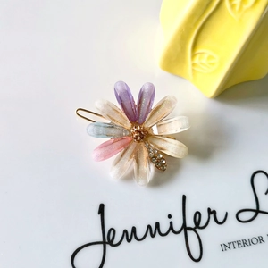 Floral daisy hair clip with colorful glitter petals and sparkling rhinestones for women