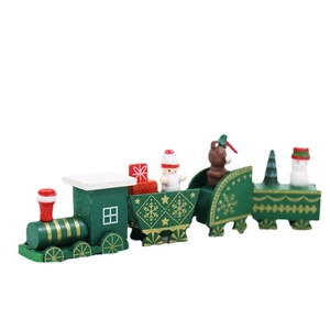 Wooden Christmas train ornament with snowman and tree figures on white background