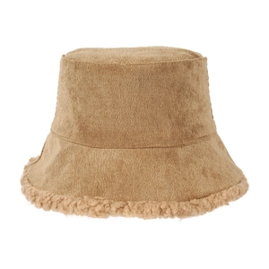 Detail of winter khaki bucket hat with corduroy texture and fluffy lamb wool brim edges