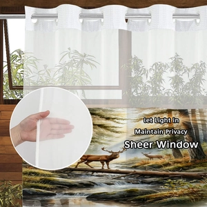 Detail of waffle elk print shower curtain showing light filtering and privacy features