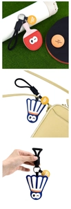 Detail of creative PU leather sports keychains with racket and shuttlecock designs