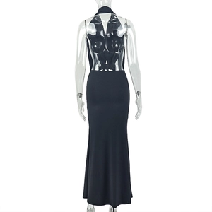 Back view detail of black backless maxi dress with gathered waist and halter neckline