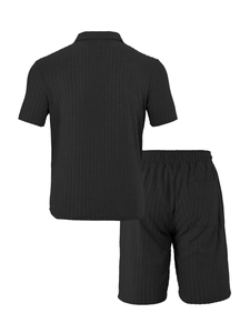 Detail of black vertical striped knit fabric on men's short sleeve polo and shorts set