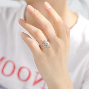 Silver square Celtic knot stainless steel open ring shown on a hand in a close-up shot