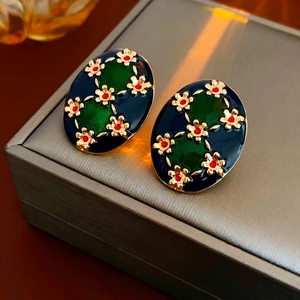 Vintage oval enamel floral stud earrings with blue green oil drip and gold flower accents