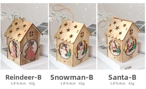 Detail of wooden LED Christmas houses featuring elk, snowman and Santa Claus designs