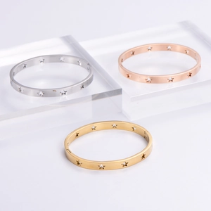 Hollow star bangle bracelets in gold, silver, and rose gold stainless steel for women