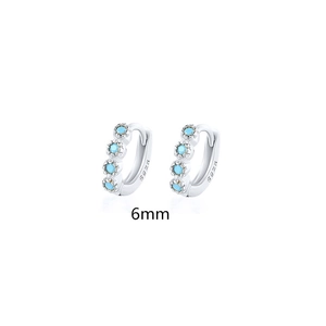 Detail view of 6mm S925 sterling silver hoop earrings with small turquoise stones