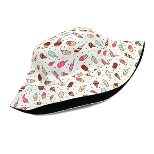 Detail view of cotton bucket hat featuring colorful ice cream prints and black inner lining