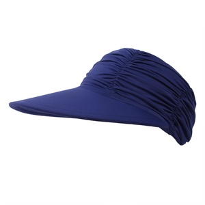Detail of navy blue sun hat showing wide brim and elastic pleated fabric texture