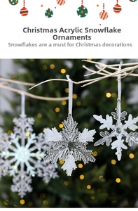 Detailed view of intricate acrylic snowflake hanging on a twig with festive bokeh lights