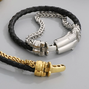 Close-up of double-layered men's woven leather bracelet with mechanical steel clasp