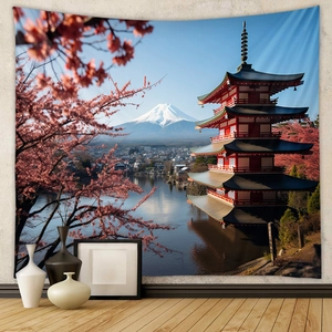 Detailed view of bohemian tapestry featuring Mount Fuji and cherry blossoms on wall