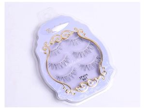 Close-up of 3 pairs of natural crossover eyelashes with transparent bands in model N01