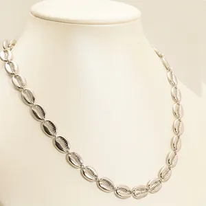 18k gold plated hollow cowrie shell link necklace with an elegant ocean design for women