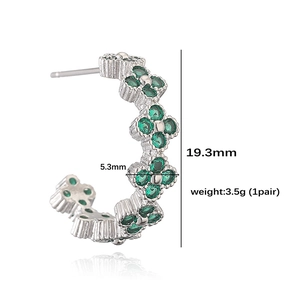 Silver clover stud earrings with green crystals, 19.3mm height side view with reflection