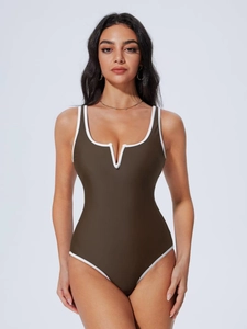 Deep brown one-piece swimsuit with white contrast piping and V-neckline for women