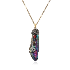 Rainbow crystal pendant necklace with golden chain and seven chakra stones on white background