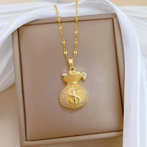 Titanium steel money bag pendant necklace with crystals on beige box with silk decor