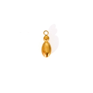 Macro detail of glossy gold-plated bubble mini pendant with metallic luster and bail