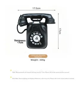 Detail view of vintage wall-mounted phone model showing dimensions 17.5x17x7 cm