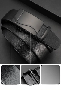 Detail of men's leather belt showing double rubber slots and matte black buckle