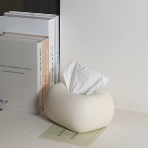 Boîte à mouchoirs minimaliste style crème au design de galet pour une décoration moderne