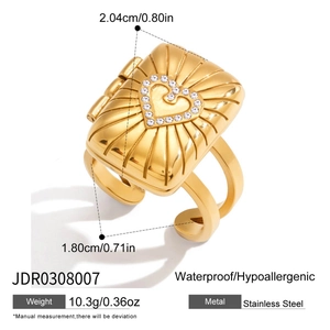 Macro shot of 18K gold plated square locket ring featuring a zircon heart pattern