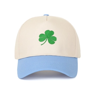 Close-up of four-leaf clover embroidery on a color-block five-panel baseball cap