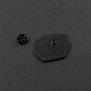 Milk carton enamel pin featuring black metal textured back with rubber butterfly clutch