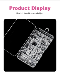 Detailed view of clear square fake nails in a 10-grid transparent organizer box