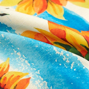 Linen texture cushion cover with bright orange and yellow digital floral prints