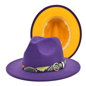 Detail of purple fedora hat with yellow lining and snakeskin leather belt accessory