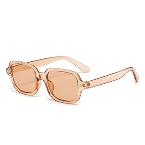 Retro rectangle sunglasses in amber translucent frame with 45-degree angle view