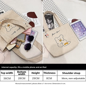 Detailed size chart of a large corduroy tote bag showing interior capacity and dimensions