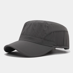 Detailed macro view of quick-dry water-resistant flat top cadet cap in charcoal grey