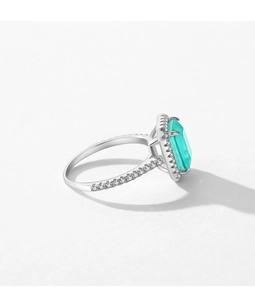 Detail of s925 silver ring featuring emerald-cut turquoise gemstone with diamond halo