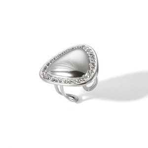Detailed view of silver triangle open ring with sparkling crystal inlay on white background