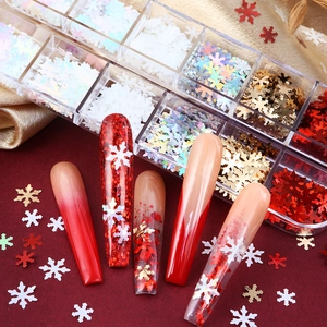 Christmas snowflake nail sequins in a 12-grid box with diverse colors and styles