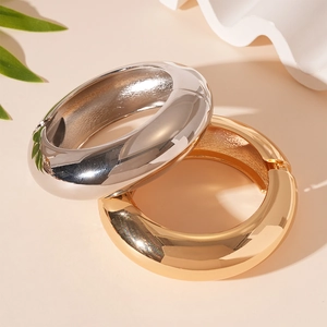 Polished gold and silver minimalist open cuff bracelets with thick geometric metal bands