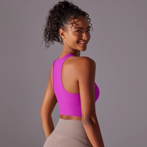 Close-up of a women's racerback sports bra in rose purple with high support design