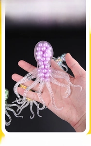 Detailed close-up of a colorful octopus stress toy filled with purple water beads inside