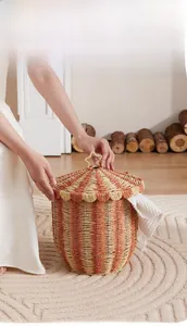 Detailed view of striped rattan circus basket with scalloped lid and star handle