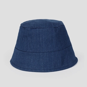 Detail shot of navy blue corduroy bucket hat with a textured vertical ribbed pattern